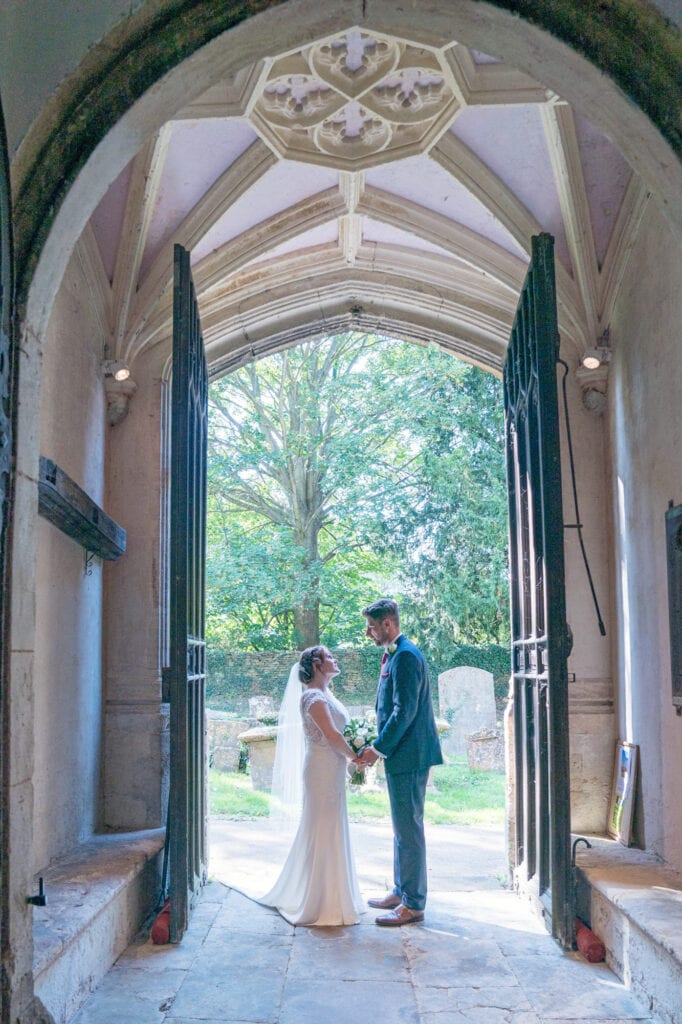 Oxfordshire Wedding Photo of bride and groom at church
