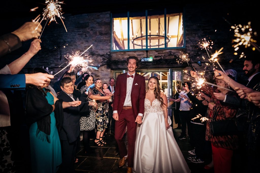 winter wedding at the great barn ayhno sparklers