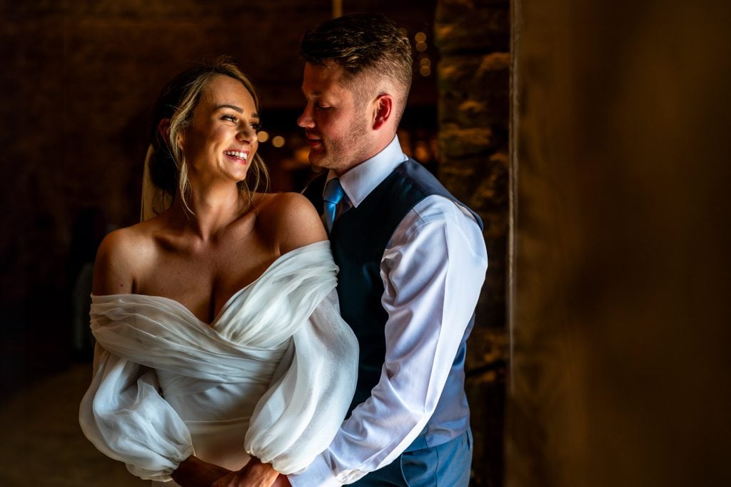bride and groom at the great barn