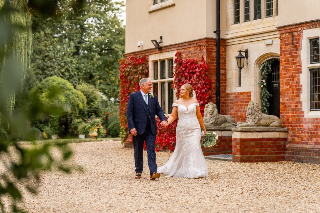 Plum Park wedding photos in front of the venue